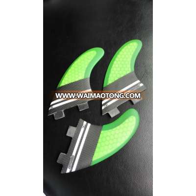 hot FCS G5 surfboard fins with carbon fiber/honey comb